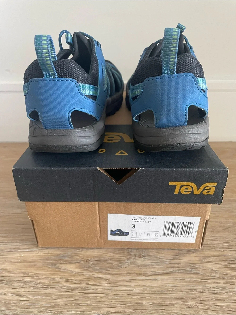 Teva kids size 4 Blue and Black Closed-Toe Water Sandals